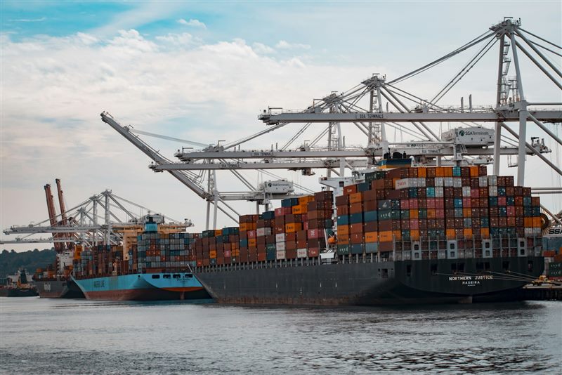 Container cargo ship navigating ocean trade routes